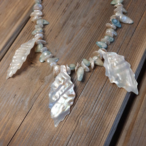 Freshwater keishi and blister pearls and mother of pearl necklace.